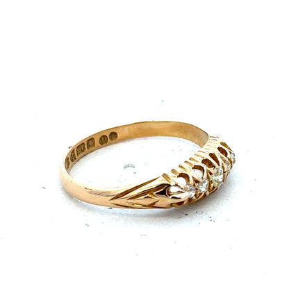 18ct yellow gold diamond ring in size P, featuring a classic design and weighing 3.1 grams.