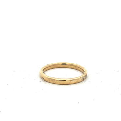 18ct yellow gold diamond ring size P, unbranded, featuring a sparkling diamond set in a sleek gold band.