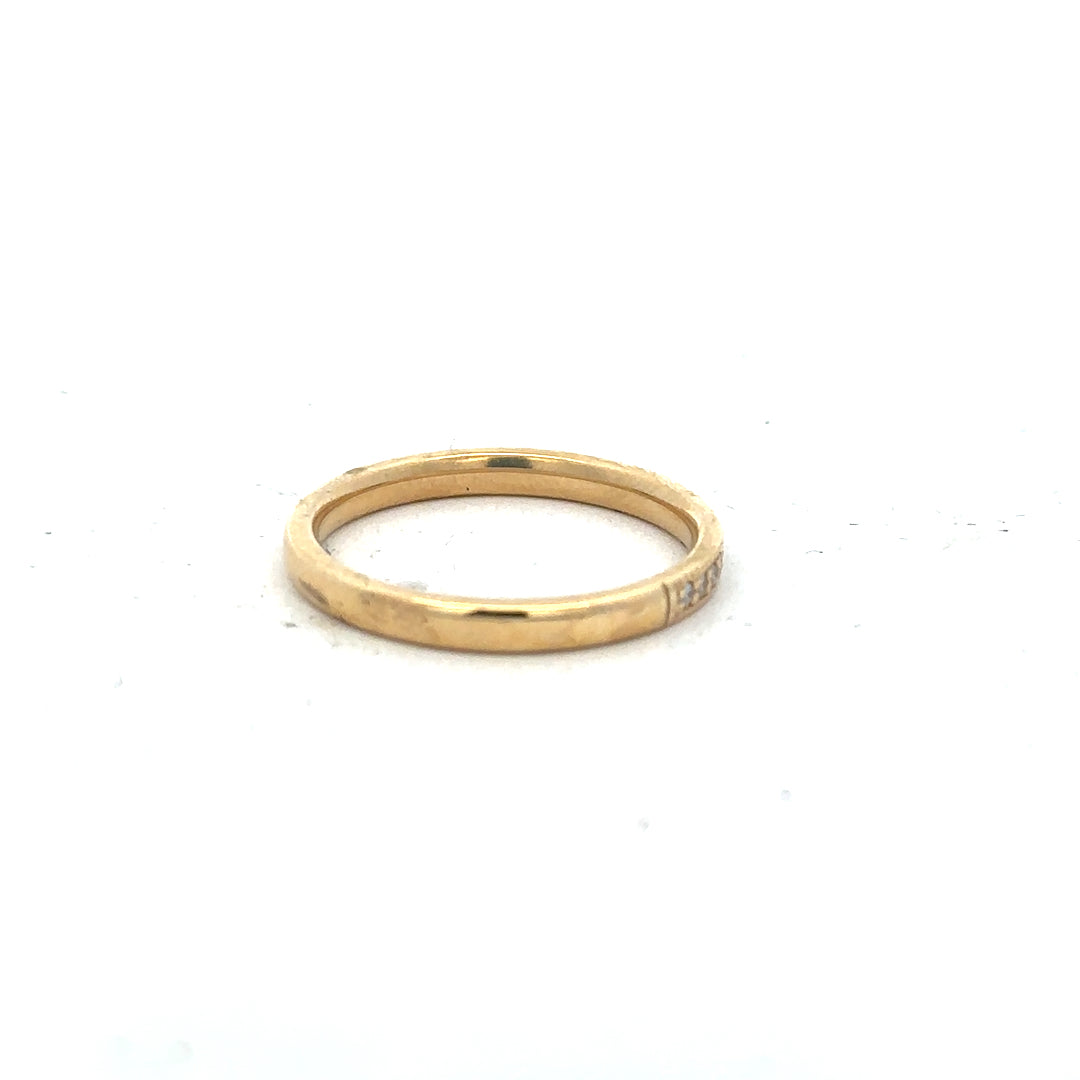 18ct yellow gold diamond ring in size P, featuring a sparkling diamond setting and a polished band.