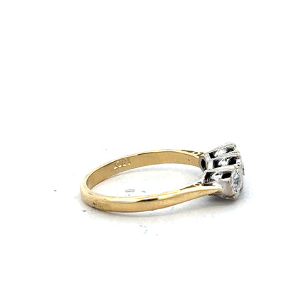 18ct yellow gold diamond ring in size P with sparkling diamonds, showcasing elegant craftsmanship and a classic design.