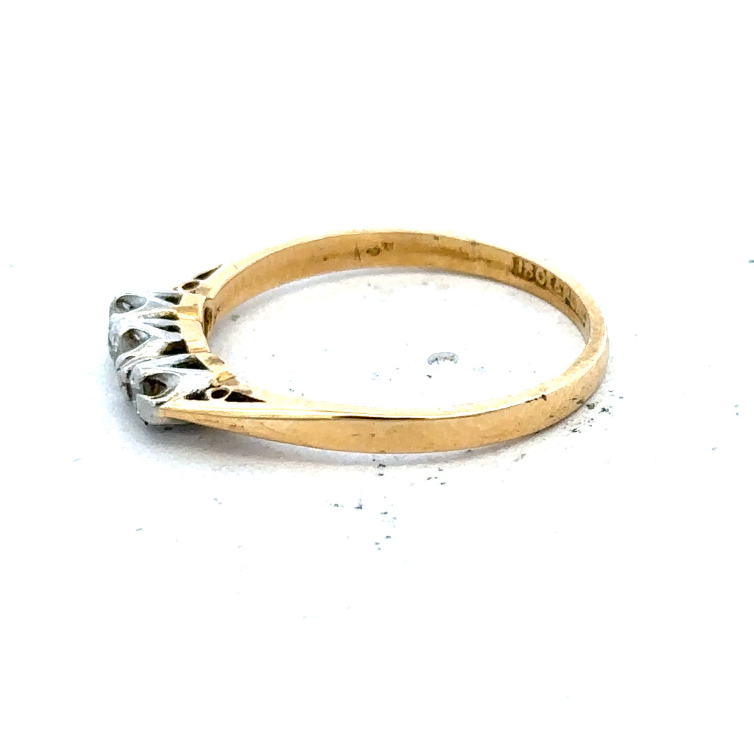 18ct yellow gold diamond ring, size P1/2, featuring a sleek band with sparkling diamonds.