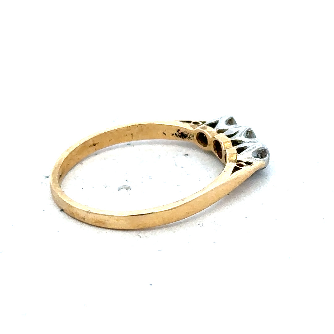 18ct yellow gold diamond ring in size P 1/2 with a sparkling diamond and simple band design.