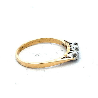 18ct yellow gold diamond ring in size P1/2 with a classic design, featuring sparkling diamonds on a polished gold band.