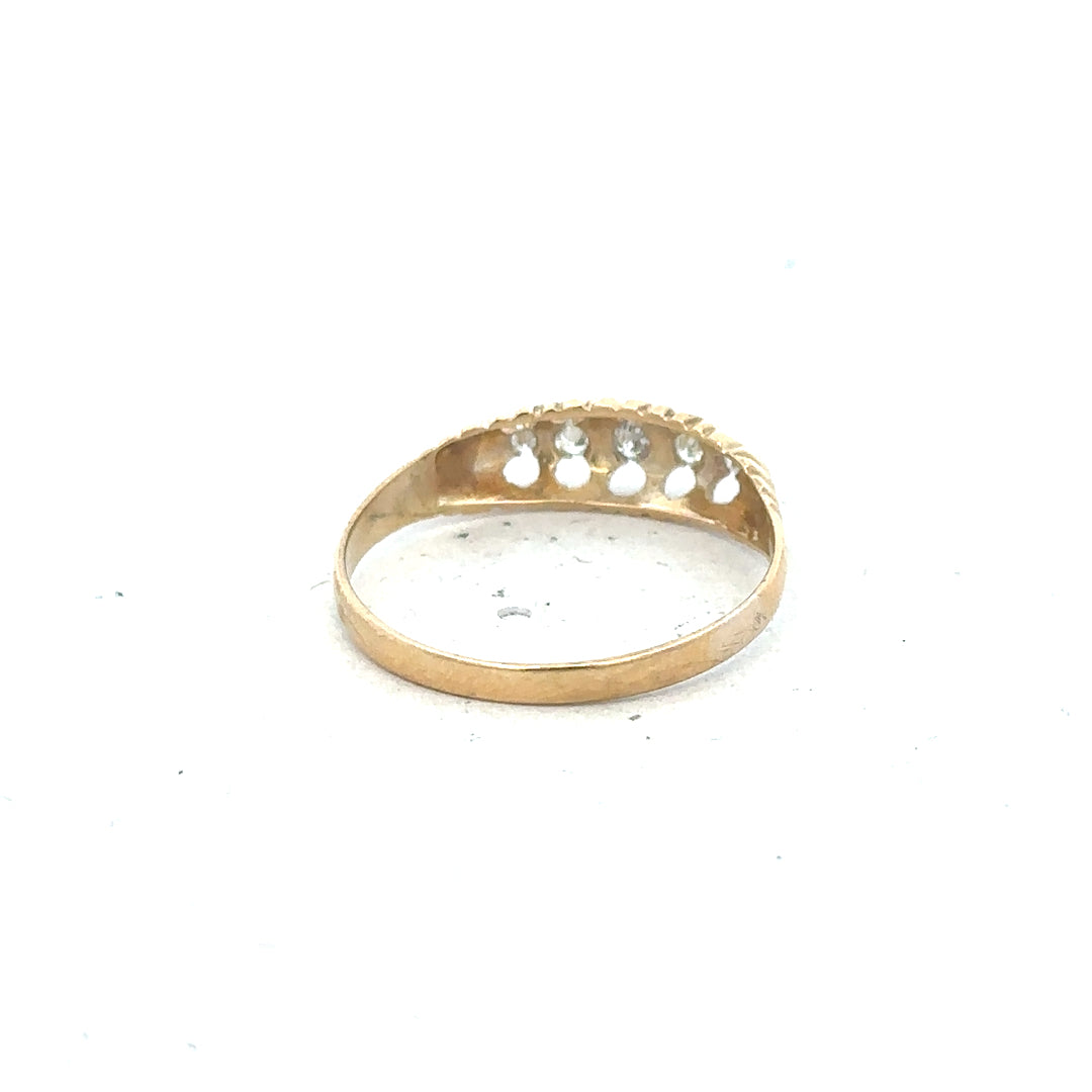 18ct yellow gold diamond ring in size S, featuring a sparkling diamond setting and a sleek, elegant band.