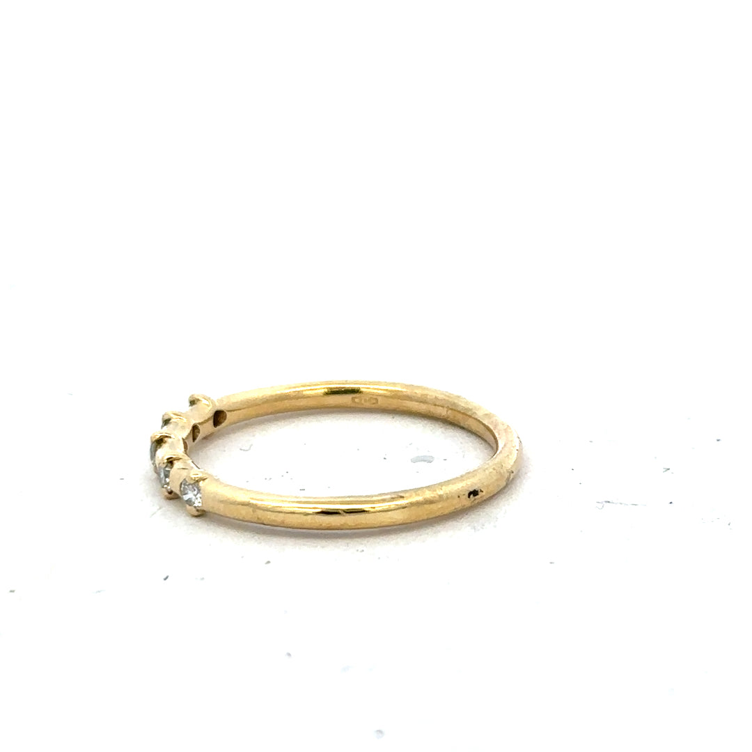 18ct yellow gold diamond ring in size S, featuring sparkling diamonds set in an elegant band.