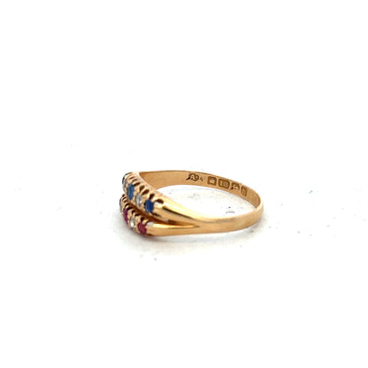 18ct yellow gold ring with diamonds, rubies, and sapphires, size P, featuring colorful gemstone accents.