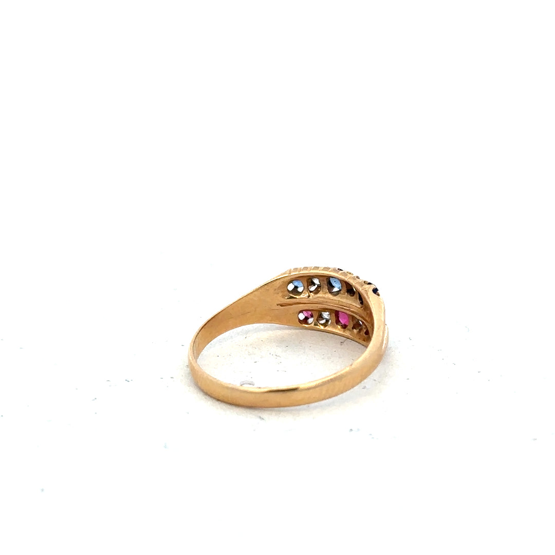 18ct yellow gold ring with diamonds, rubies, and sapphires, size P, featuring a colorful gemstone design.
