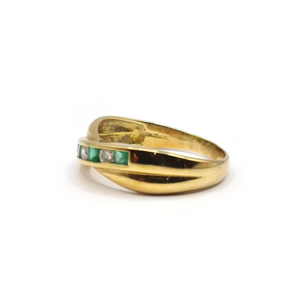 18ct yellow gold emerald and diamond half eternity ring with alternating gemstones, elegant and sparkling design.