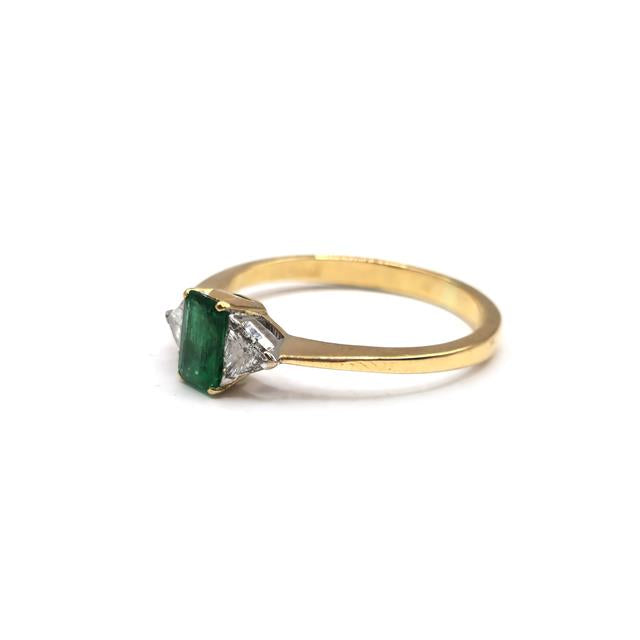 18ct yellow gold emerald and diamond ring with intricate detailing, showcasing vibrant gemstones and fine craftsmanship.