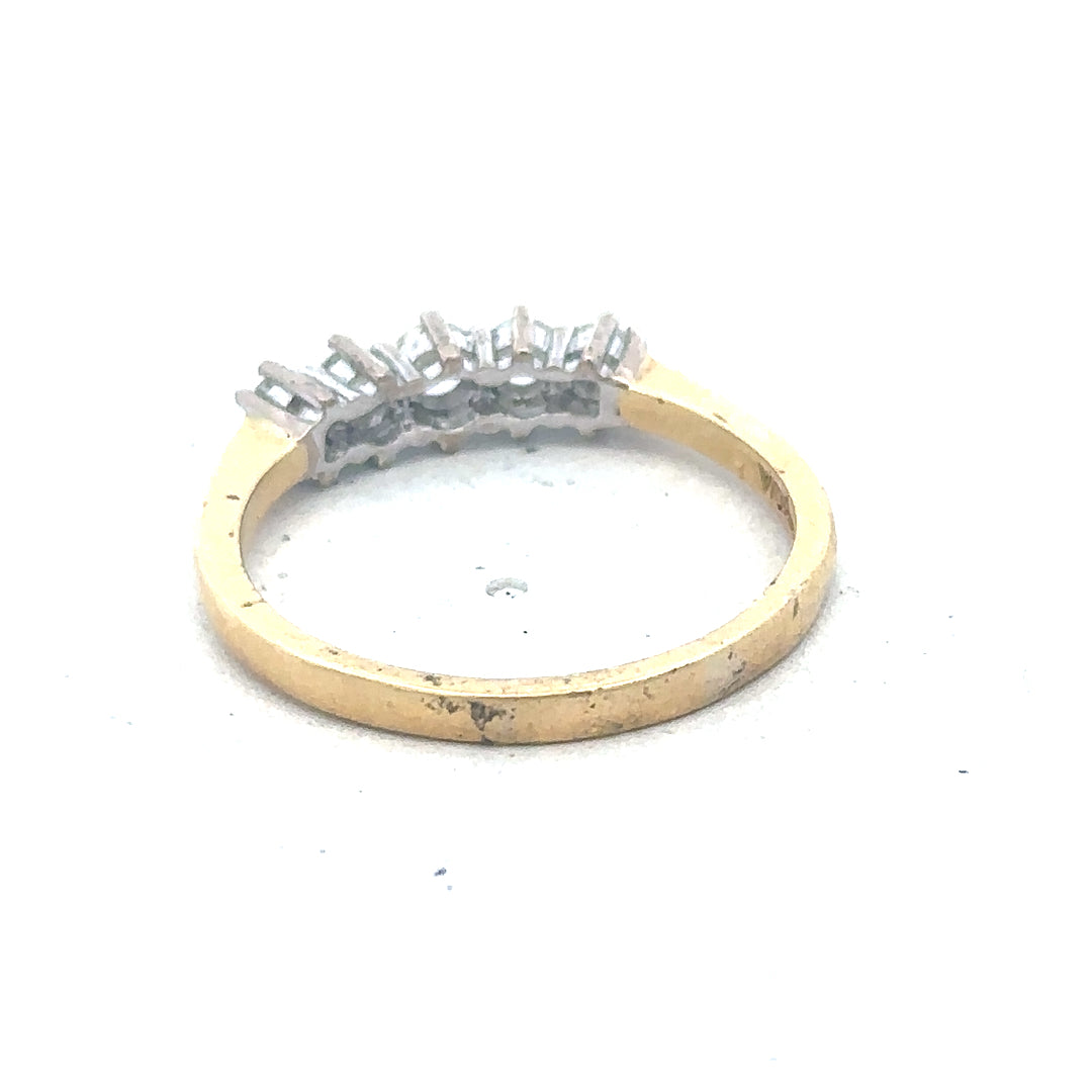 18ct yellow gold five-stone diamond ring with 1/2 carat total weight, featuring sparkling diamonds on a classic band.