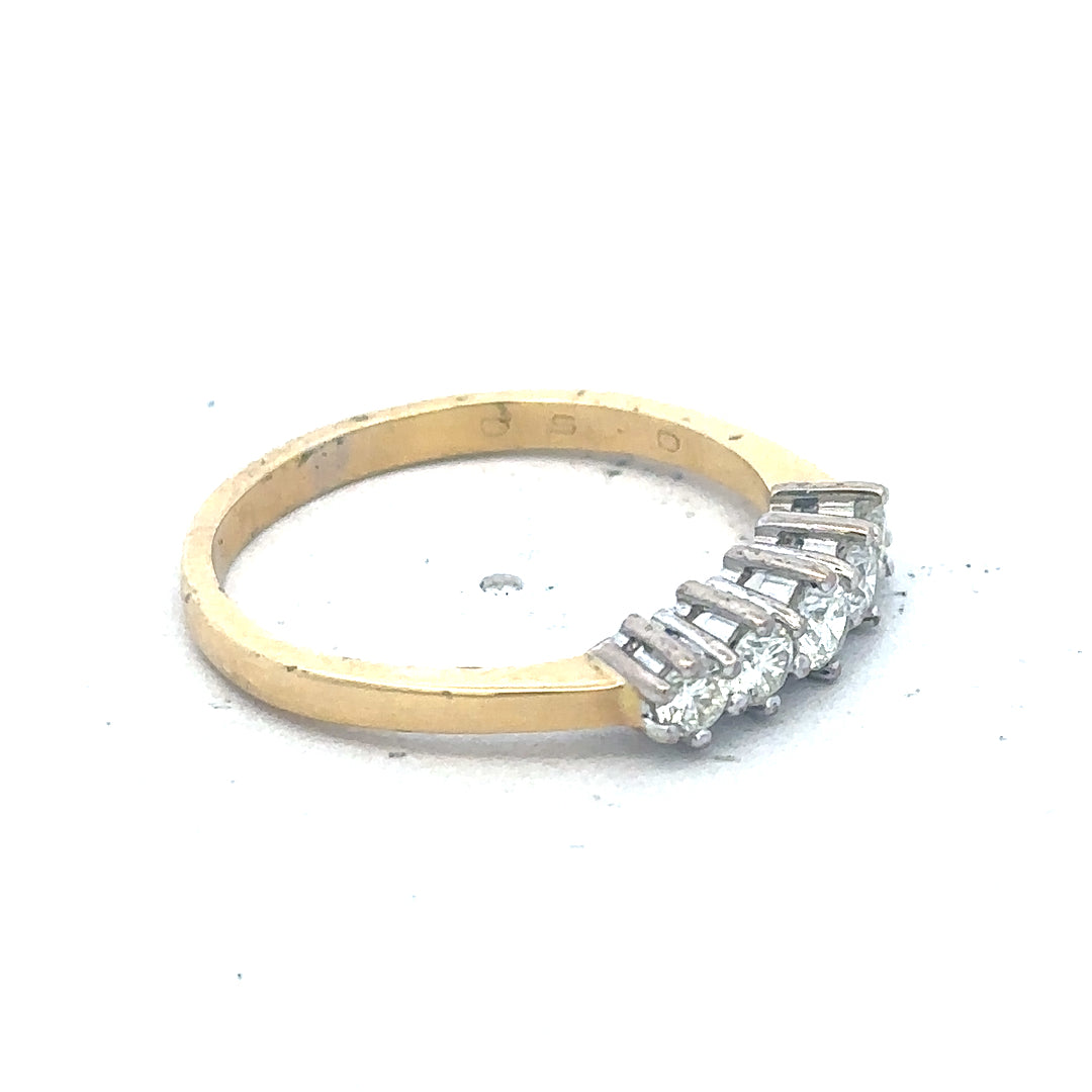 18ct yellow gold five-stone diamond ring with 1/2 carat total weight, showcasing sparkling diamonds and elegant craftsmanship.