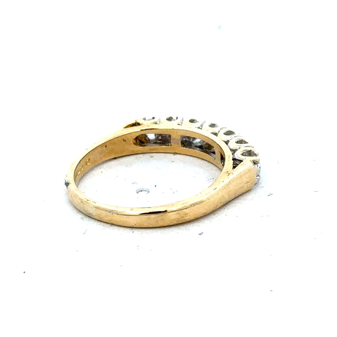 18ct yellow gold half eternity diamond ring with sparkling diamonds, elegant and timeless jewelry piece.