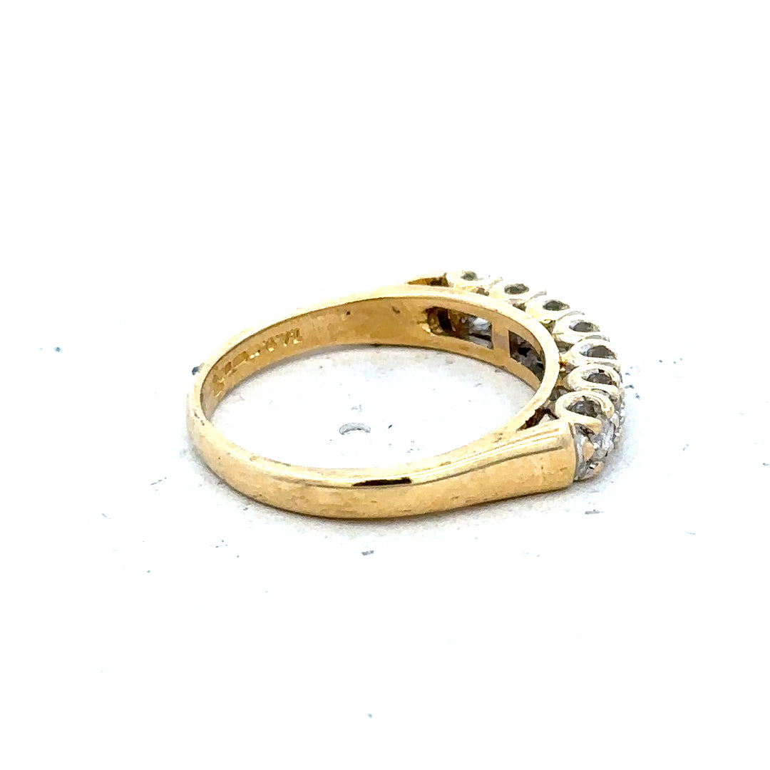 18ct yellow gold half eternity diamond ring with sparkling diamonds set around the band, unbranded jewelry accessory.