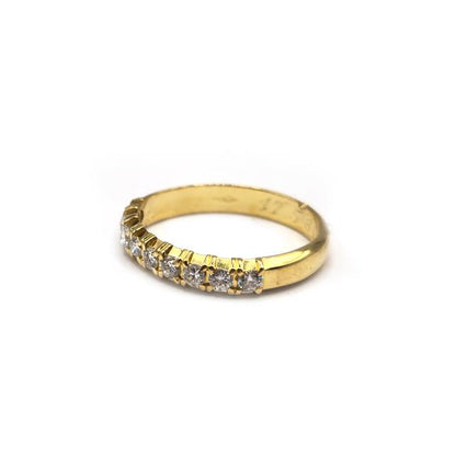 18ct yellow gold half eternity diamond ring with sparkling diamonds, featuring a classic and elegant design.