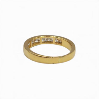 18ct yellow gold half eternity diamond ring with sparkling diamonds, elegant and stylish jewelry piece.