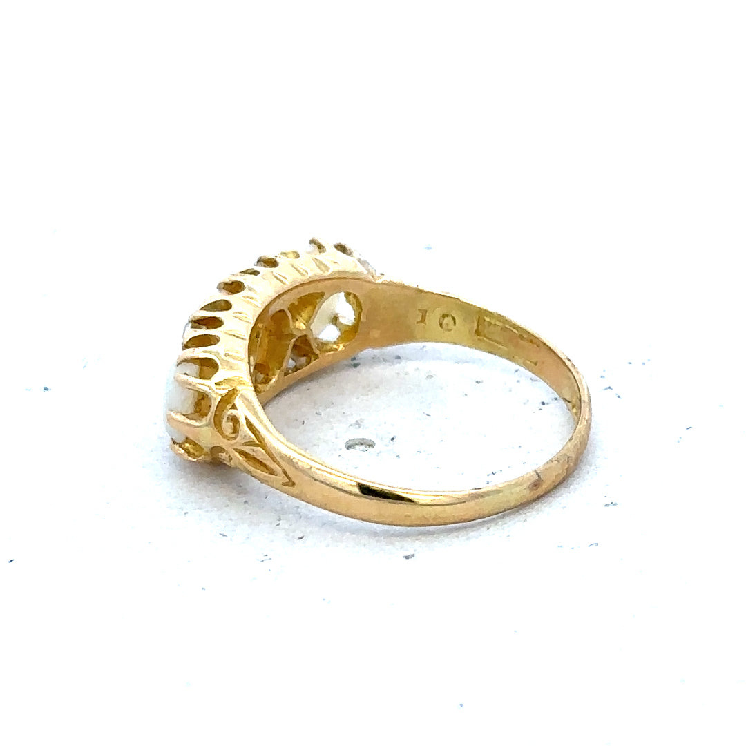 18ct yellow gold opal and diamond ring, size M, showcasing a vibrant opal centerpiece with sparkling diamonds.