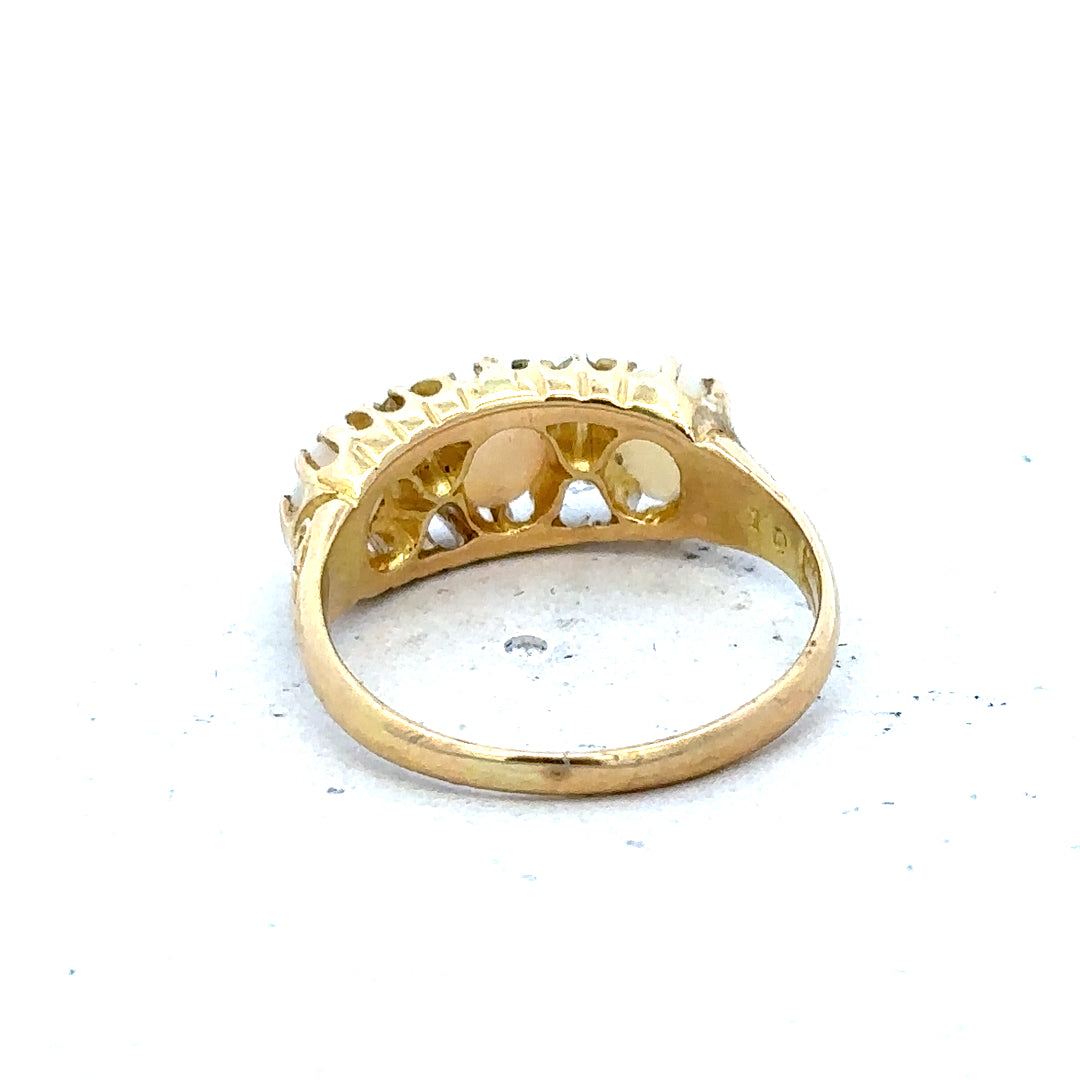 18ct yellow gold opal and diamond ring, size M, featuring a vibrant opal centerpiece and sparkling diamonds.