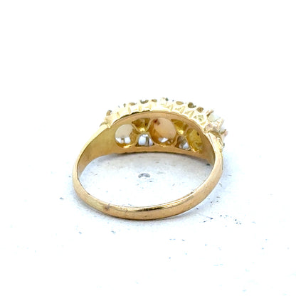 18ct yellow gold opal and diamond ring, size M, featuring a vibrant opal centerpiece with sparkling diamonds.