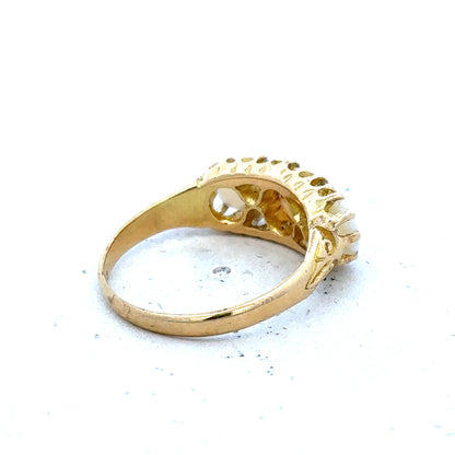 18ct yellow gold opal and diamond ring in size M, featuring a vibrant opal centerpiece and sparkling diamonds.