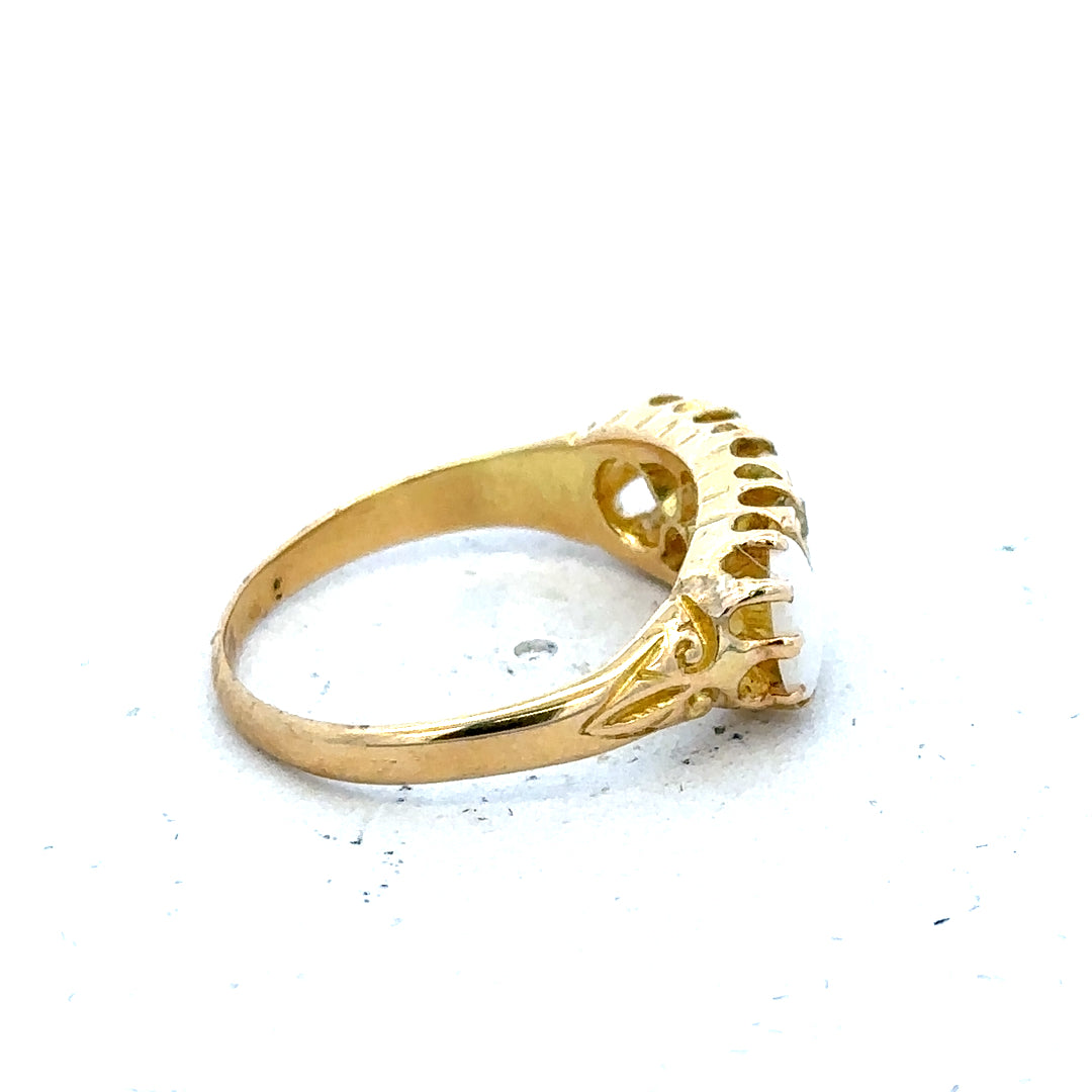 18ct yellow gold opal and diamond ring in size M, featuring a vibrant opal centerpiece with sparkling diamonds.