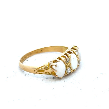 18ct yellow gold opal and diamond ring, size M, showcasing vibrant opal centerpiece with sparkling diamonds in a fine jewelry design.