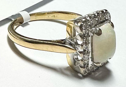 18ct yellow gold opal and diamond ring, size N 1/2, featuring a vibrant opal centerpiece with sparkling diamonds on a sleek band.