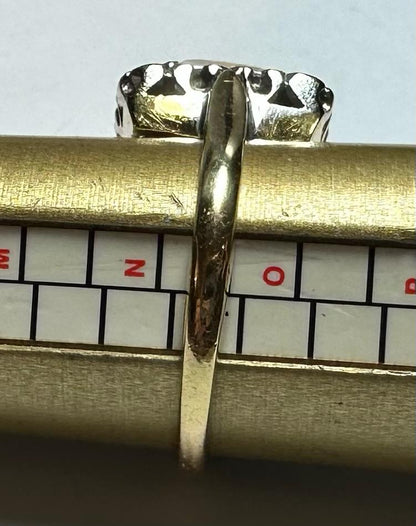 18ct yellow gold opal and diamond ring in size N1/2, featuring a vibrant opal and sparkling diamonds on a gold band.