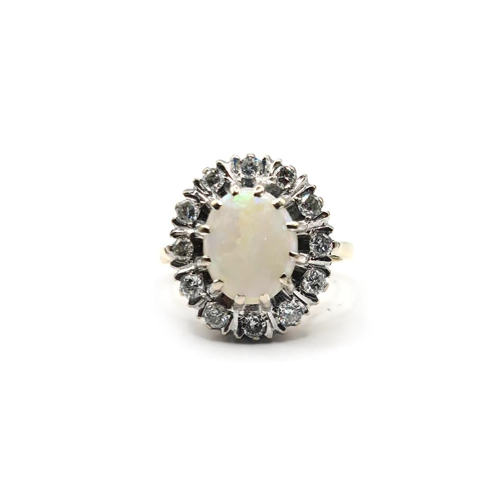 18ct yellow gold oval opal and diamond ring featuring 1.85 carat opal and 0.60 carat diamonds, elegant jewelry piece.