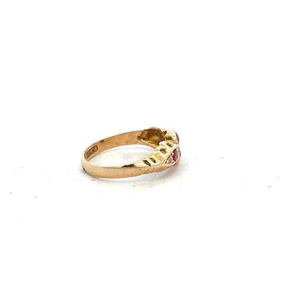18ct yellow gold ring in size M with a smooth band, unbranded jewelry shown against a neutral background.