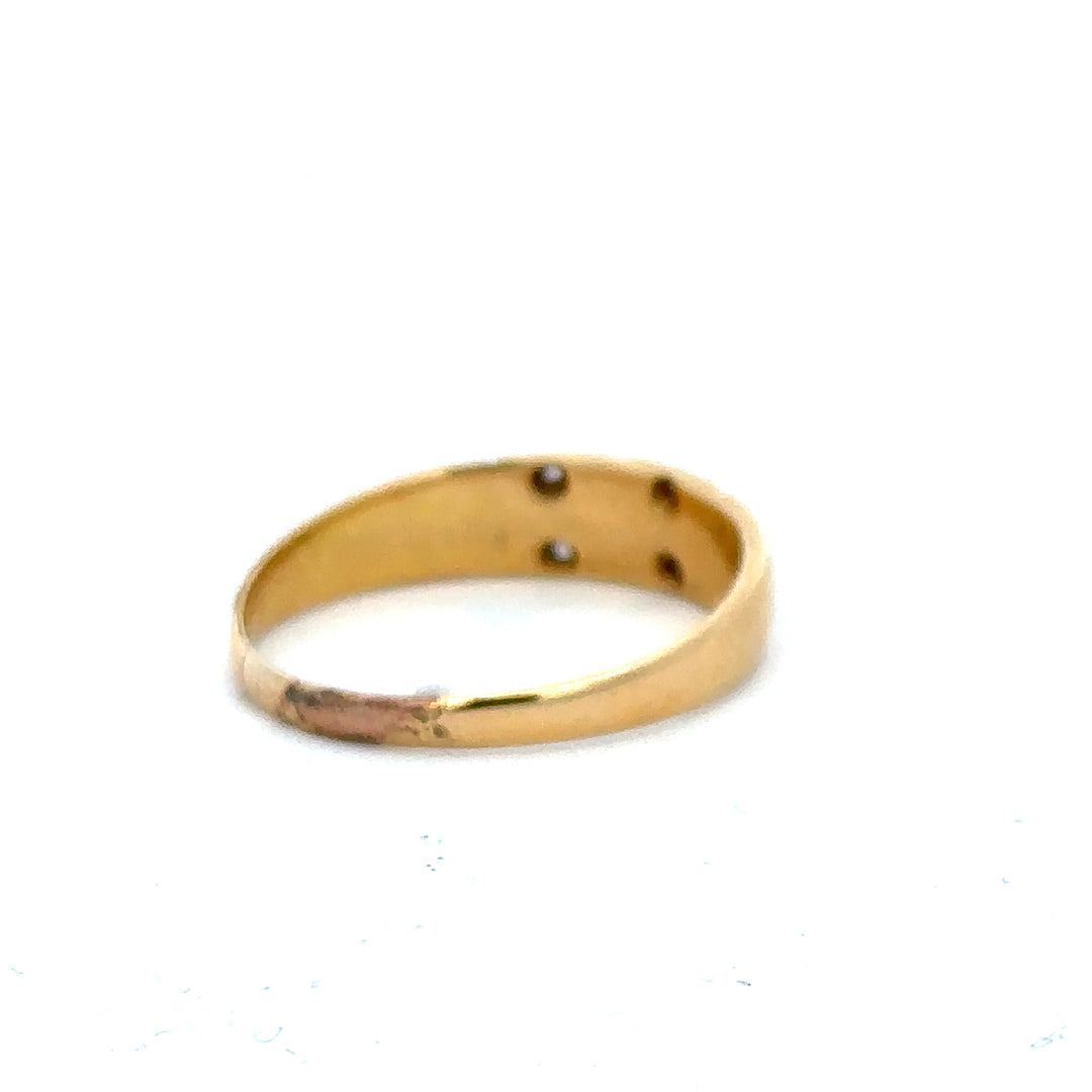 18ct yellow gold ring in size P1/2, unbranded, showcasing a smooth polished band suitable for everyday wear.