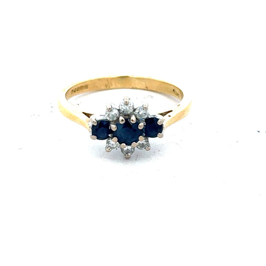18ct yellow gold sapphire and diamond ring, size K, featuring a sparkling gemstone and elegant design.