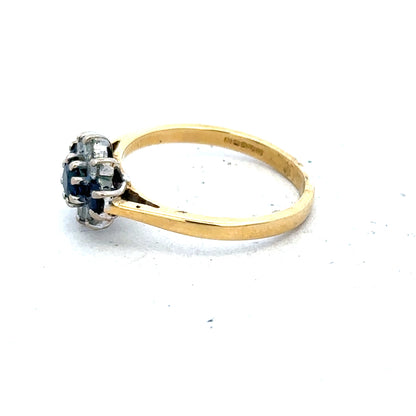 18ct yellow gold sapphire and diamond ring, size K, featuring a central sapphire with diamond accents.