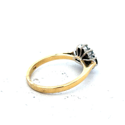 18ct yellow gold sapphire and diamond ring, size K, showcasing a sparkling blue sapphire center with accent diamonds.