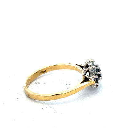 18ct yellow gold sapphire and diamond ring, size K, featuring a sparkling gemstone and elegant gold band.