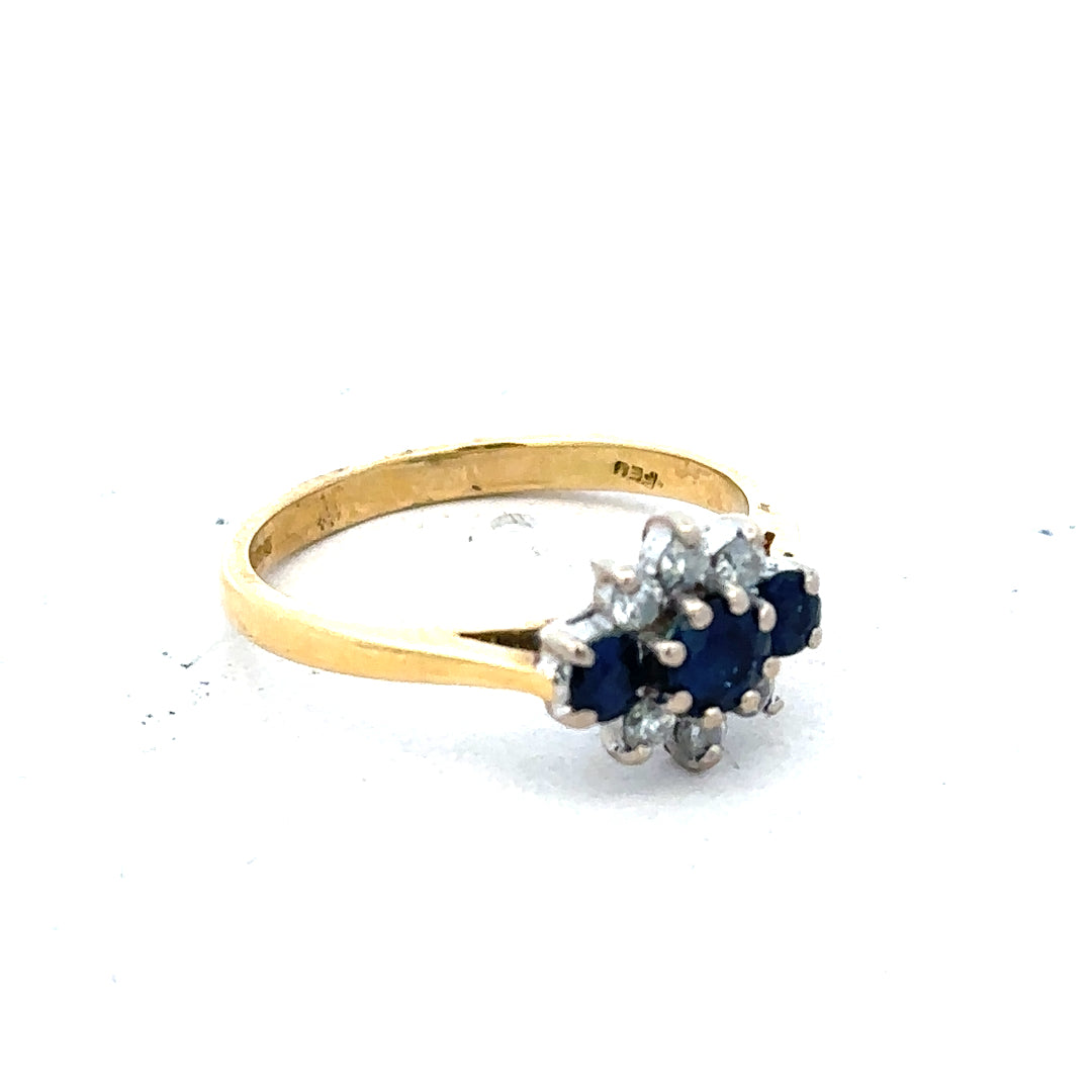 18ct yellow gold sapphire and diamond ring, size K, featuring a stunning gemstone centerpiece and elegant gold band.