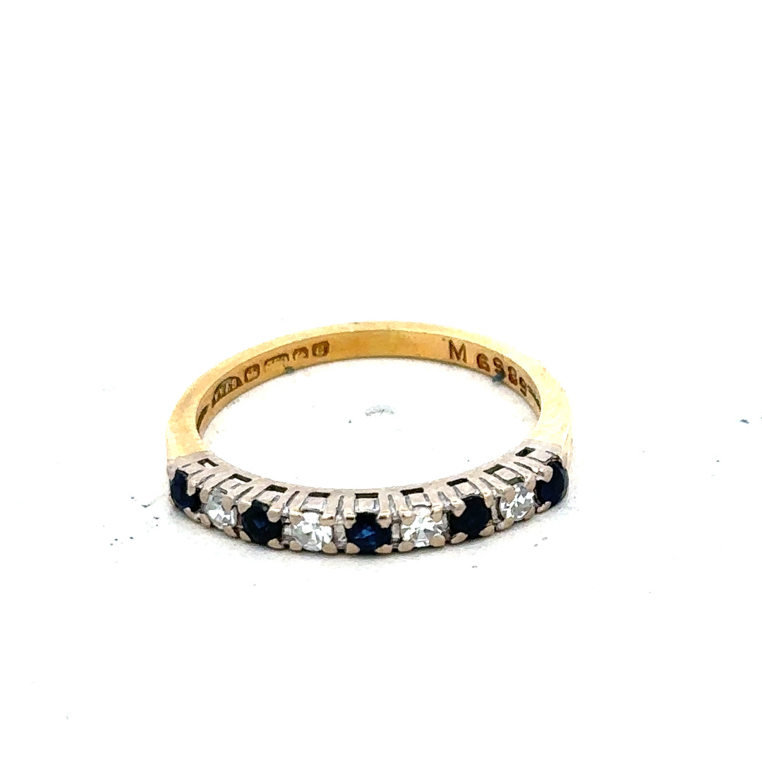 18ct yellow gold sapphire and diamond ring with size L1/2, featuring a detailed design and sparkling gemstones.