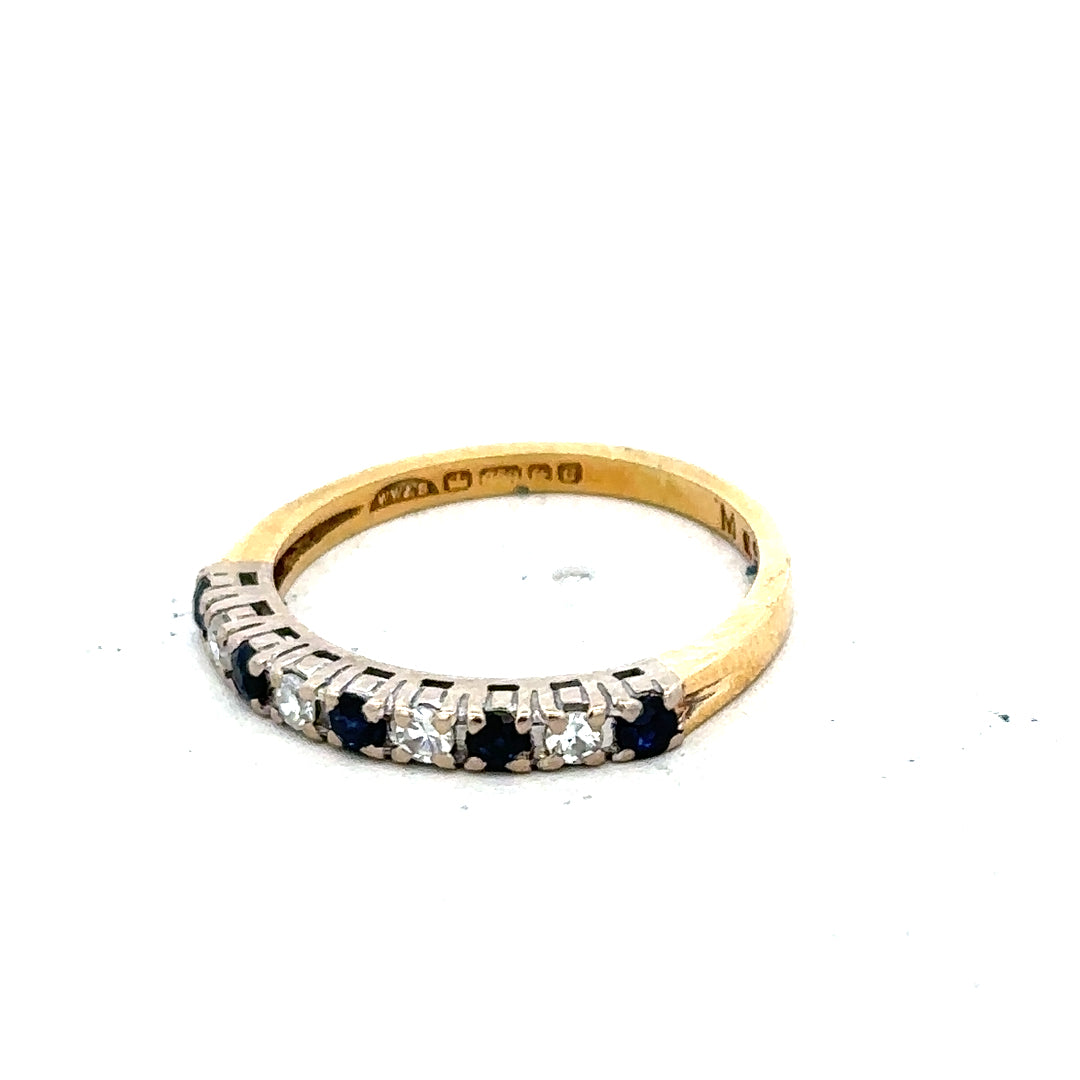 18ct yellow gold sapphire and diamond ring, size L1/2, featuring a detailed design with sparkling gemstones.