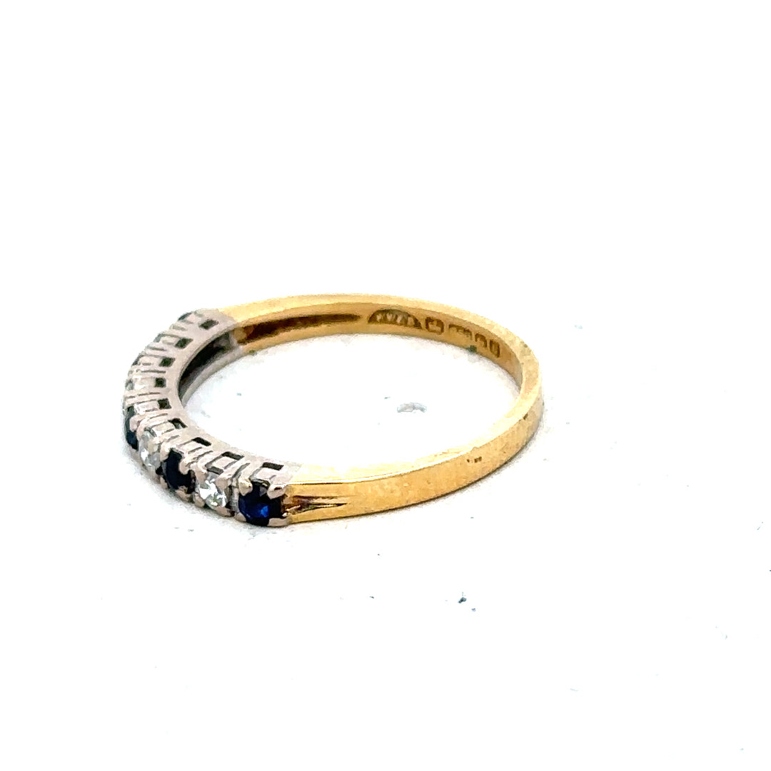 18ct yellow gold sapphire and diamond ring, size L 1/2, featuring a vibrant blue sapphire and sparkling diamonds.