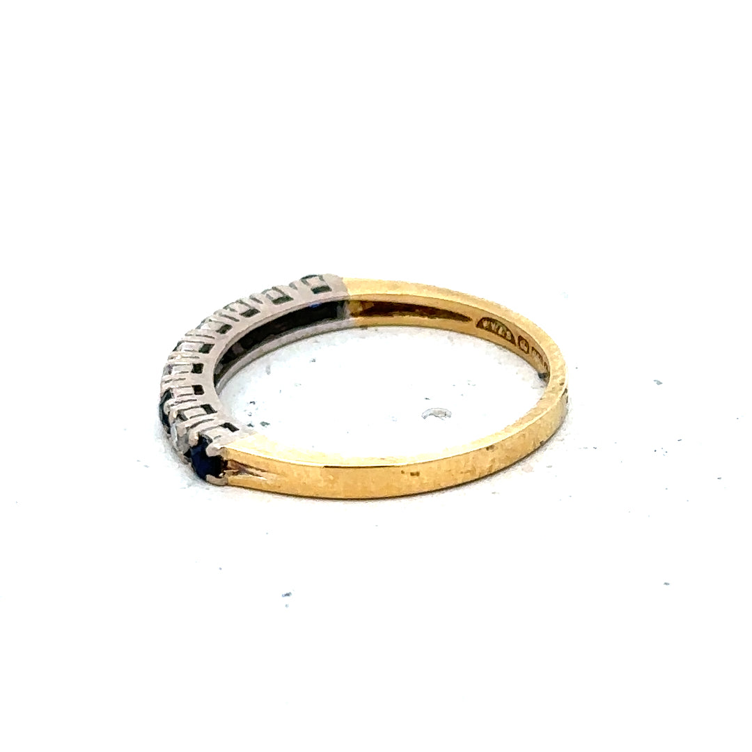 18ct yellow gold sapphire and diamond ring in size L1/2, showcasing a sparkling central sapphire with surrounding diamonds.