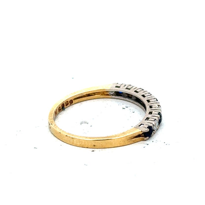 18ct yellow gold sapphire and diamond ring, size L 1/2, with a detailed close-up of the elegant gemstone setting.