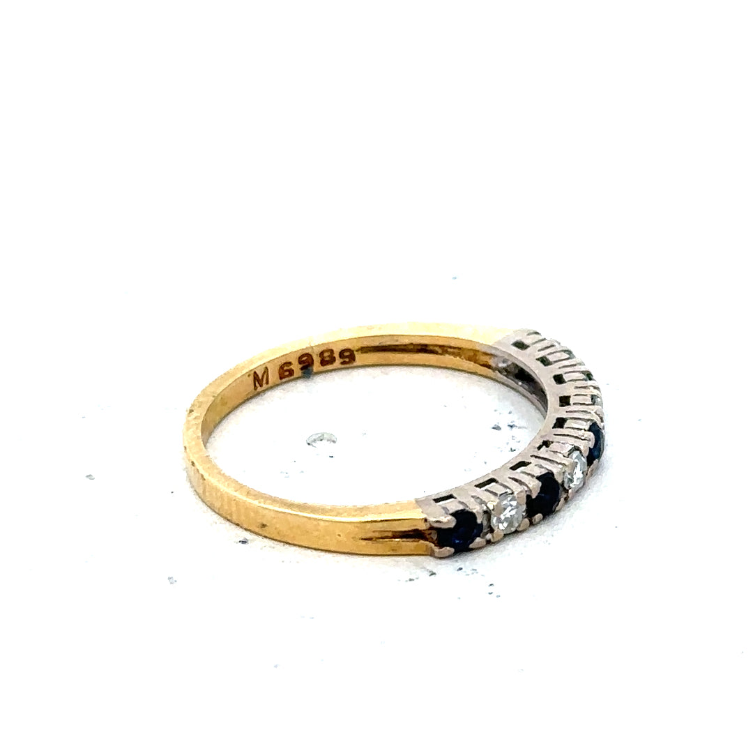 18ct yellow gold sapphire and diamond ring, size L1/2, featuring a vibrant blue sapphire with sparkling diamonds.