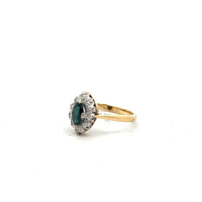 18ct yellow gold sapphire and diamond ring in size M, featuring a central sapphire with diamond accents, elegant jewelry piece.