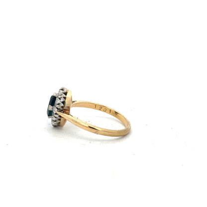 18ct yellow gold sapphire and diamond ring in size M, featuring a central sapphire and sparkling diamonds.