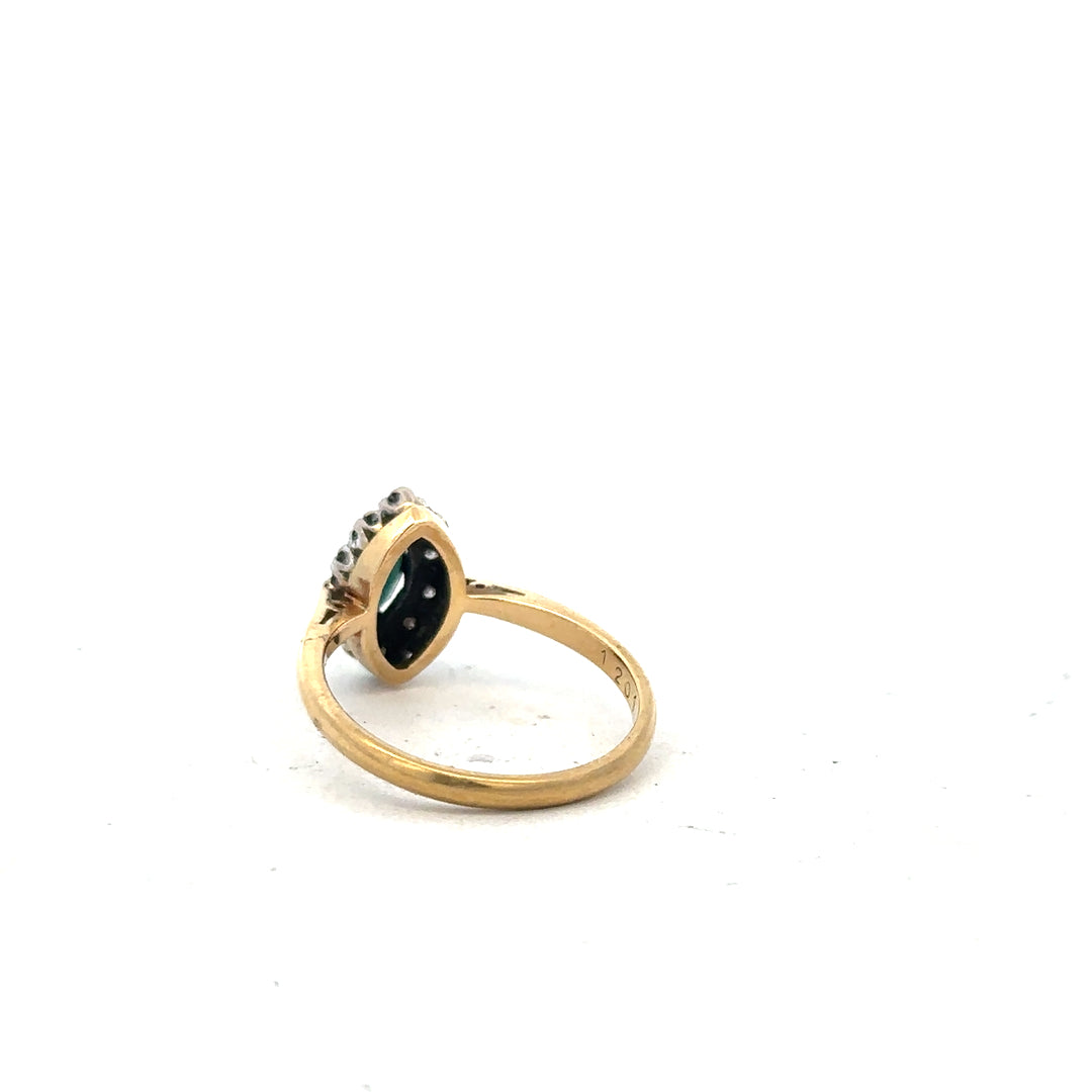 18ct yellow gold sapphire and diamond ring in size M, featuring a vibrant blue sapphire and sparkling diamonds.
