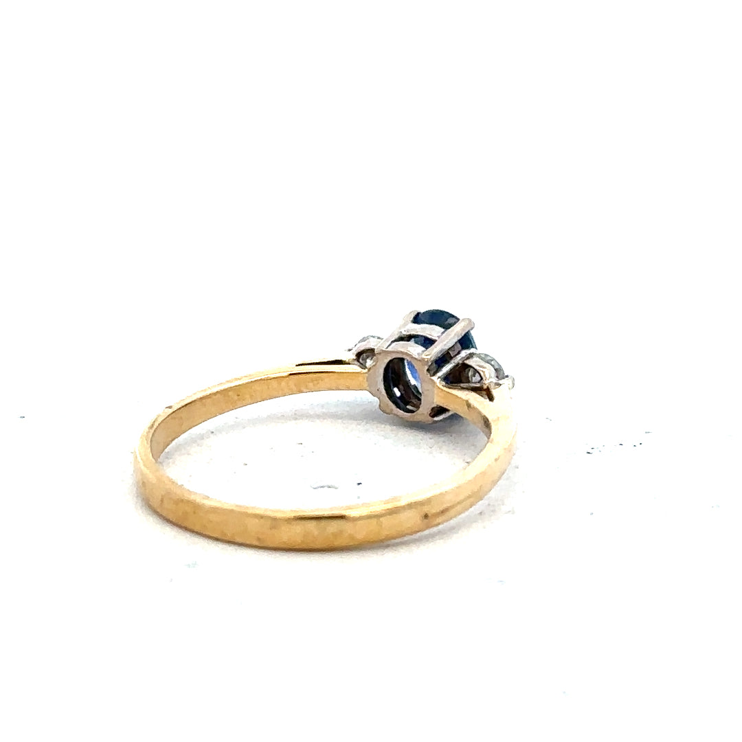 18ct yellow gold sapphire and diamond ring, size M, unbranded jewelry with vibrant blue sapphire and sparkling diamonds.