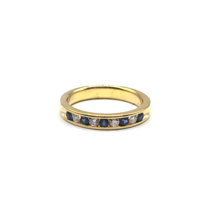 18ct yellow gold sapphire and diamond ring, size N, featuring a central sapphire and diamond accents in a luxurious jewelry design.