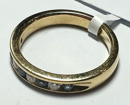 18ct yellow gold sapphire and diamond ring in size N, featuring a central sapphire with diamond accents, unbranded jewelry piece.
