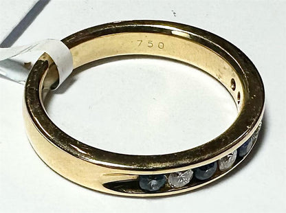 18ct yellow gold sapphire and diamond ring, size N, featuring a central blue sapphire surrounded by sparkling diamonds.