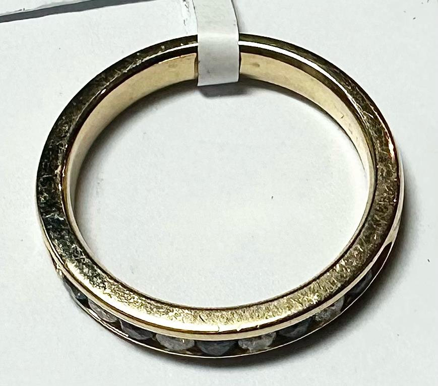 18ct yellow gold sapphire and diamond ring in size N, featuring a central blue sapphire surrounded by diamonds.