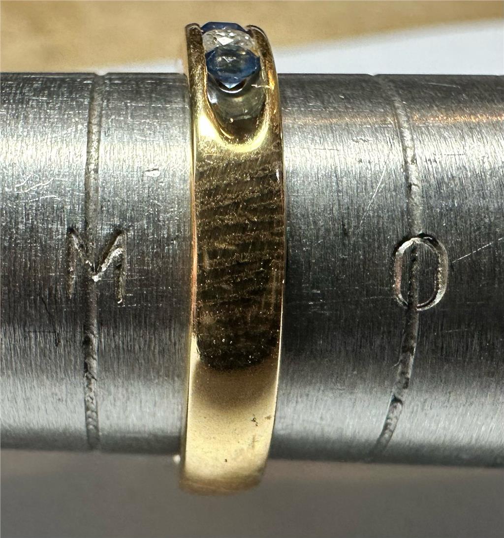 18ct yellow gold sapphire and diamond ring, size N, featuring a central sapphire gemstone and surrounding diamonds.